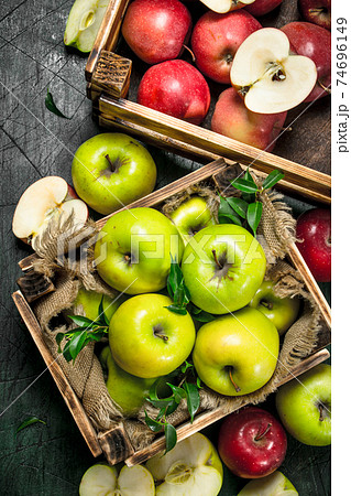 Fresh apples in boxes. Fresh apples in boxes. 74696149