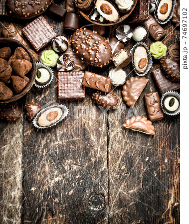 Chocolate candies in a bowls. Chocolate candies in a bowls. 74697102