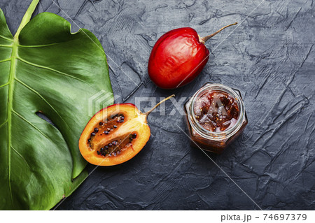 Jar of tamarillo jam. Jar of tamarillo jam. 74697379