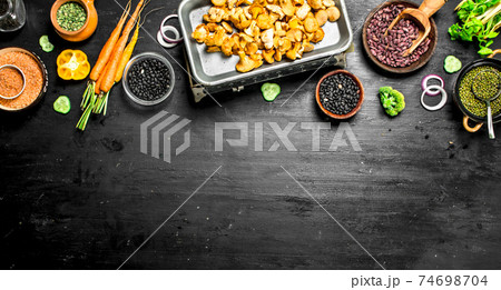 Organic food. Fresh vegetables and mushrooms. 74698704