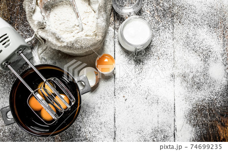Baking background. Ingredients for fresh dough. Baking background. Ingredients for fresh dough. 74699235