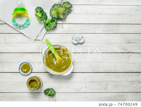 Baby food. Baby puree from broccoli. 74700249