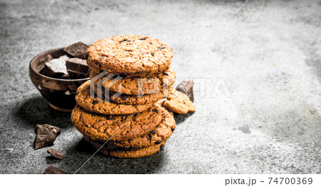 Oatmeal cookies with chocolate in a bowl. Oatmeal cookies with chocolate in a bowl. 74700369