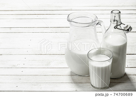 Fresh milk in pitcher. 74700689