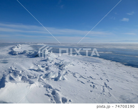 Colorful ice in winter on Lake Baikal in February Colorful ice in winter on Lake Baikal in February 74708190