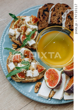 bread slicing plate honey cheese figs decorated bread slicing plate honey cheese figs decorated 74710117
