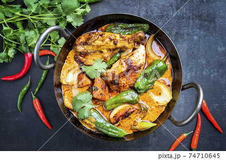 Traditional Thai kaeng massaman coconut chicken curry with jalapeno 74710645