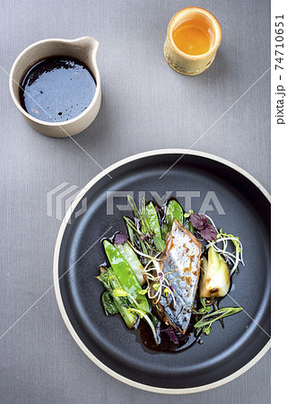bonito tuna fish filet with vegetable glazed in teriyaki sauce 74710651