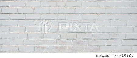 The texture of the brick wall, painted in white The texture of the brick wall, painted in white 74710836