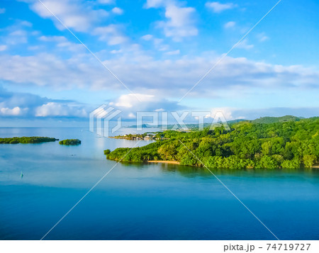 An aerial view of a tropical beach in Roatan Honduras An aerial view of a tropical beach in Roatan Honduras 74719727