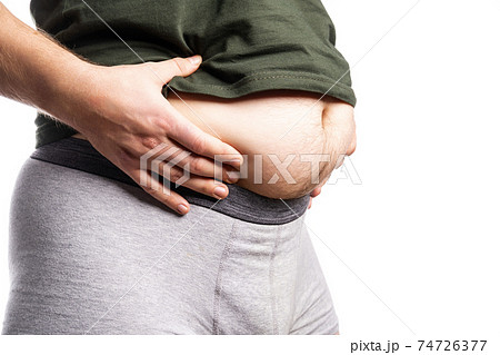 Thick torso for which a man holds his hands 74726377