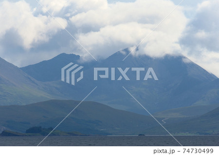 Cloud topped scottish mountain on the isle of skye. Remote wilderness Cloud topped scottish mountain on the isle of skye. Remote wilderness 74730499