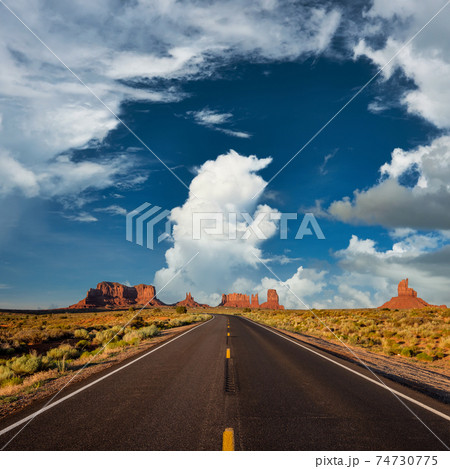 Empty scenic highway in Monument Valley 74730775