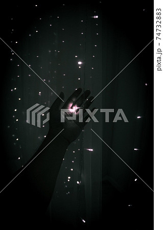 Holding a little light in the dark 74732883