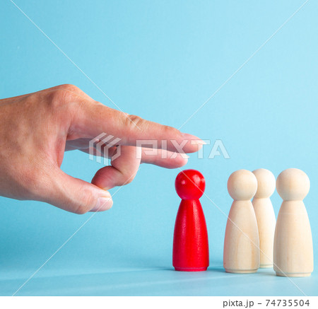 The boss big hand flicking the dismissed employee.Crisis and unemployment, humiliating dismissal. 74735504