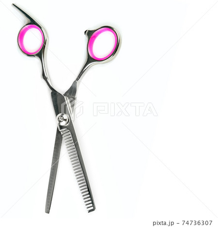 pairs of hairdressing scissors for hair cutting. isolated. Free space for text. 74736307