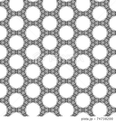 Beautiful and elegant monochromatic and grey symmetrical mandala designs on solid sheet of wallpaper. Beautiful and elegant monochromatic and grey symmetrical mandala designs on solid sheet of wallpaper. 74738200