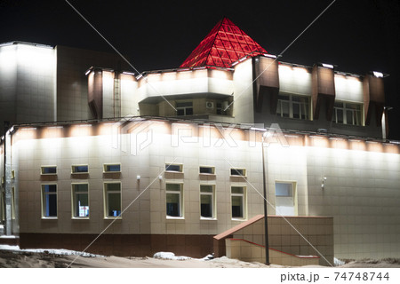 The building is abundantly illuminated by lanterns at night. 74748744