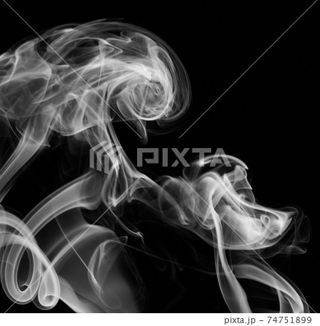 Curly clouds of grey smoke 74751899