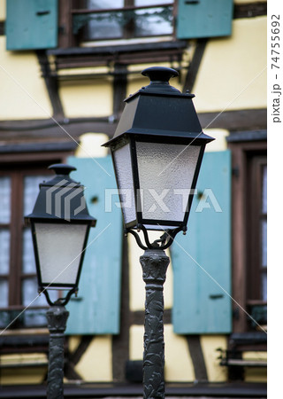 Closeup of retro street light in a typical french alsatian village 74755692