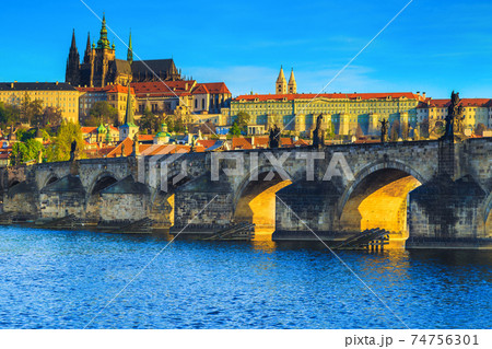 Prague cityscape view with Charles bridge over the Vltava river 74756301