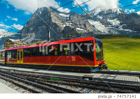 Modern tourist train in the empty train station, Grindelwald, Switzerland  74757141