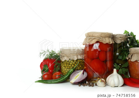 Jars with different canned food isolated on white background Jars with different canned food isolated on white background 74758556