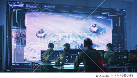 Anonymous soldiers using computers during nuclear attack 74760048