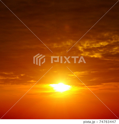 Bright red sky and sunrise. 74763447