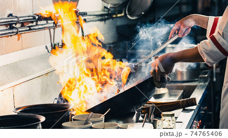 Chef stir fry cooking Chef stir fry cooking 74765406