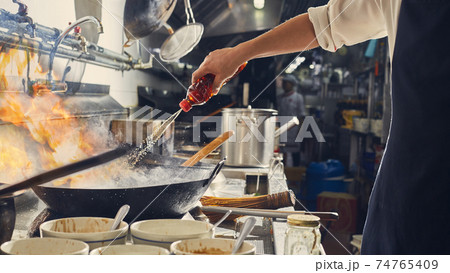 Chef stir fry cooking Chef stir fry cooking 74765409