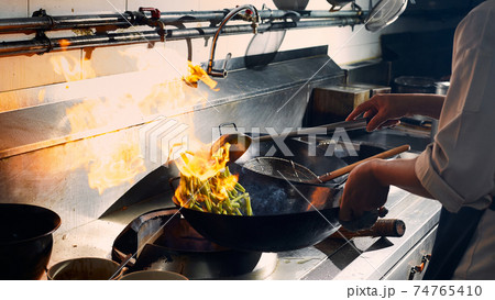 Chef stir fry cooking Chef stir fry cooking 74765410