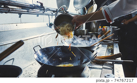 Chef stir fry cooking Chef stir fry cooking 74767217