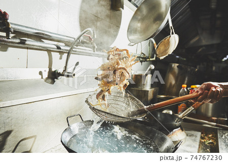 Chef stir fry cooking 74767230