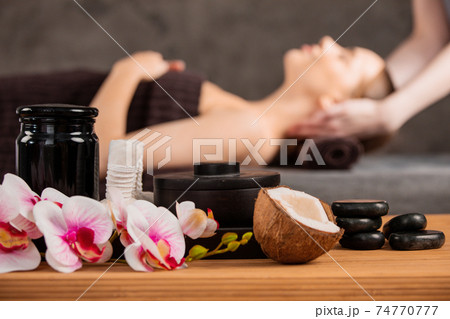 Woman getting massage in spa Woman getting massage in spa 74770777