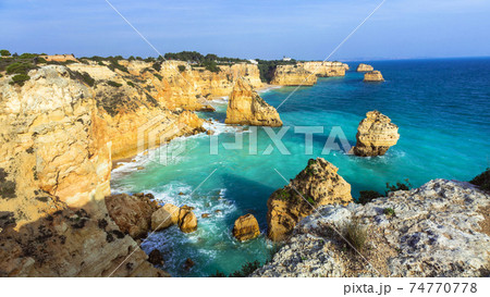 Praia da Marinha - impressive beach with rocks in Algarve, Portugal Praia da Marinha - impressive beach with rocks in Algarve, Portugal 74770778