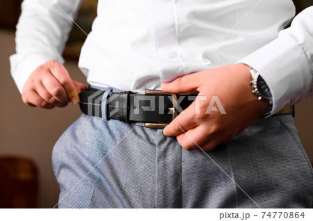 Groom's morning, details and husband's meeting on the wedding day. 74770864