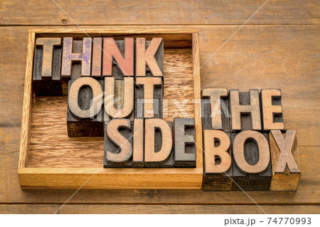 think outside the box concept in wood type 74770993