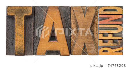 tax refund word abstract in wood type 74773298