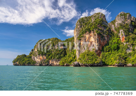Tropical islands view with ocean blue sea water at Railay Beach, Krabi Thailand nature landscape Tropical islands view with ocean blue sea water at Railay Beach, Krabi Thailand nature landscape 74778369