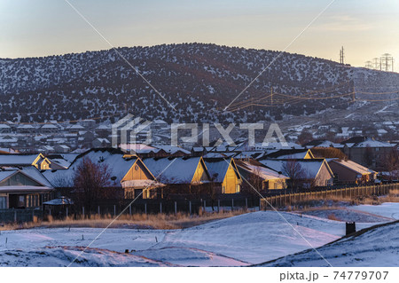 Cozy American town in the valley in winter Cozy American town in the valley in winter 74779707