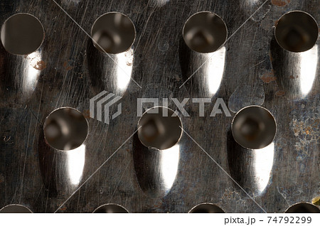 Close-up Abstract metal texture of rusted food grater 74792299