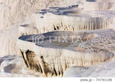 Travertines mountains of Pamukkale in Turkey. Travertines mountains of Pamukkale in Turkey. 74793196