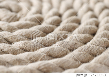 Closeup of nautical rope folded into spiral Closeup of nautical rope folded into spiral 74795804