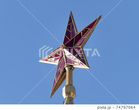 MOSCOW , RUSSIA, June 10, 2019: Ruby star on the spire of the Spasskaya Tower of the Moscow Kremlin on June 10, 2019 in Moscow, Russia MOSCOW , RUSSIA, June 10, 2019: Ruby star on the spire of the Spasskaya Tower of the Moscow Kremlin on June 10, 2019 in Moscow, Russia 74797064