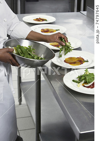 Chef Preparing Salad 74797645