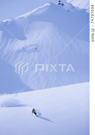 Snowboarder On Slope Snowboarder On Slope 74797698
