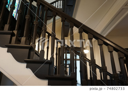 Brown wooden steps. Old vintage staircase. Rise up Brown wooden steps. Old vintage staircase. Rise up 74802733