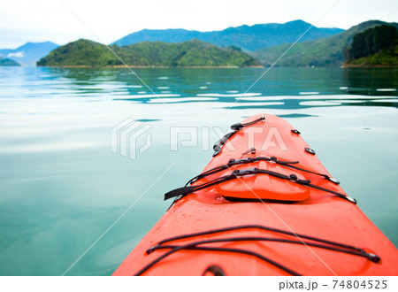 Red touring kayak 74804525