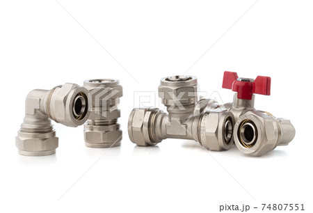 Fittings for water on a white background. Brass fittings close-up. 74807551